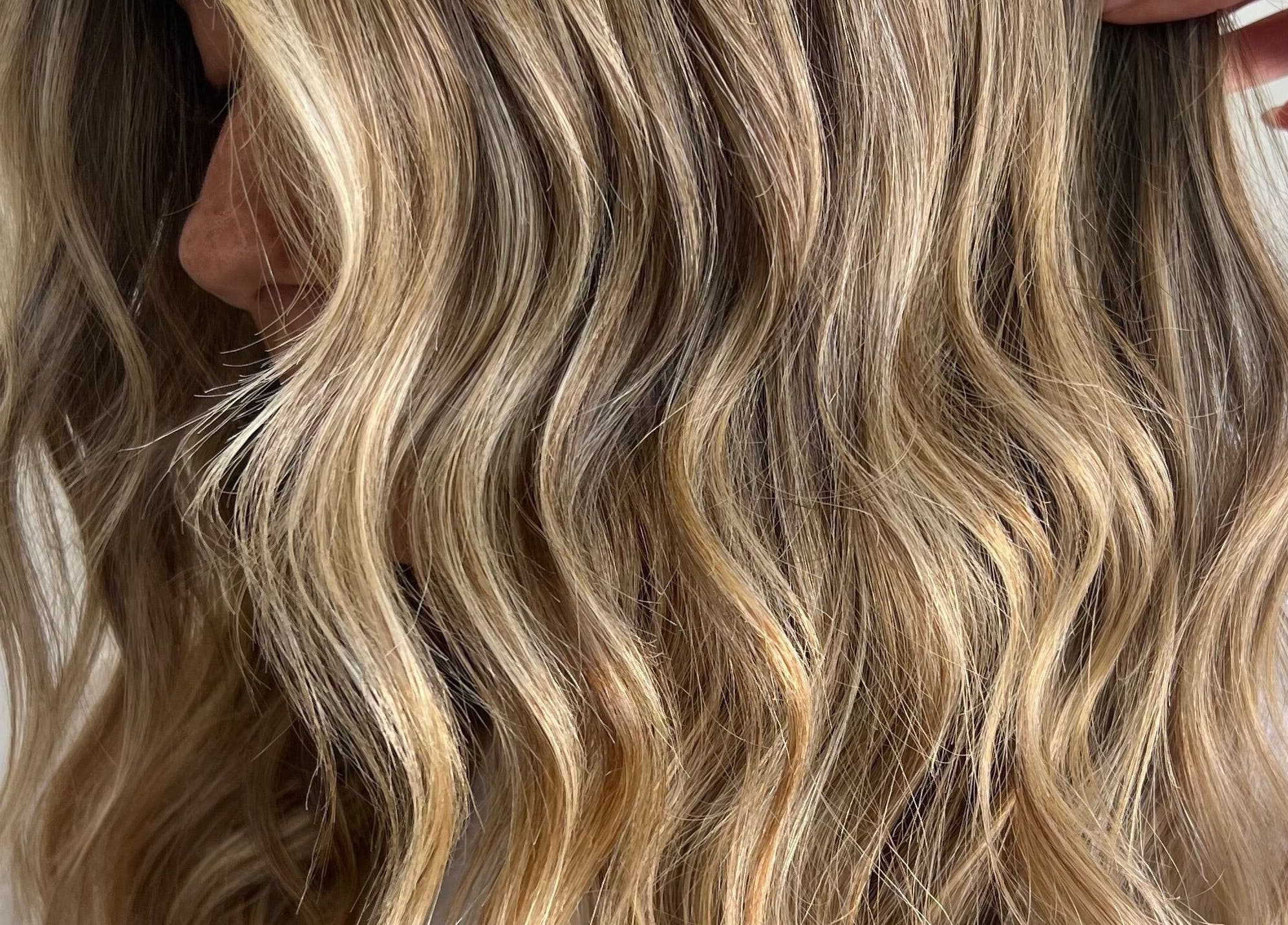 Soft, wavy blonde hair styled at Yani Mendez x Vion Salon in Boca Raton, Florida, US.