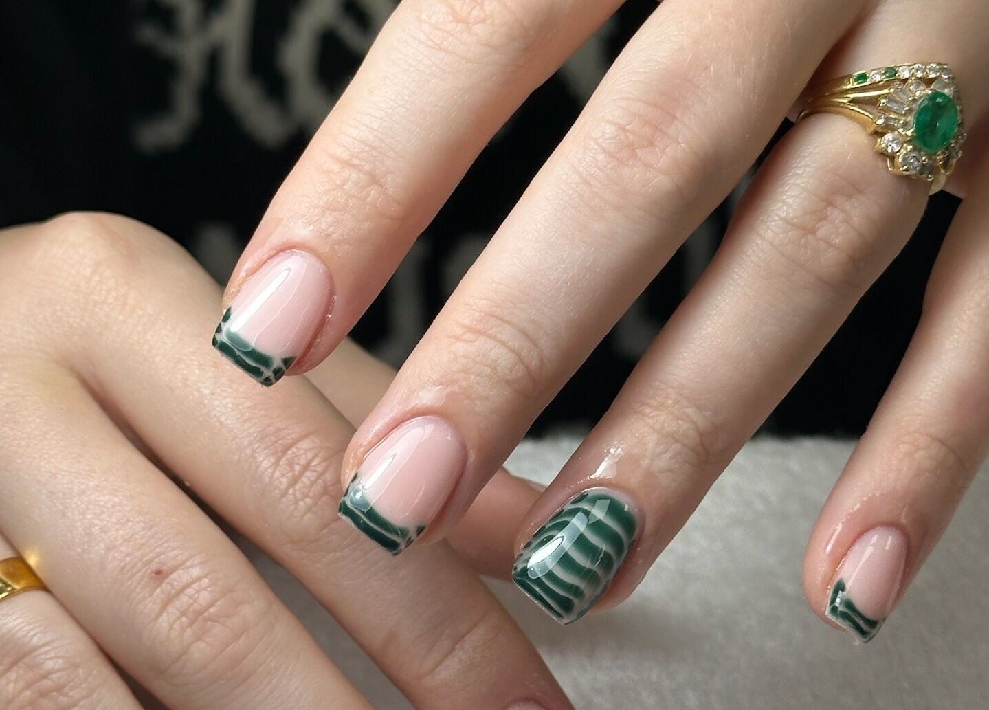 Elegant green marble nail design at Onn Nails, Stockport, England, GB.