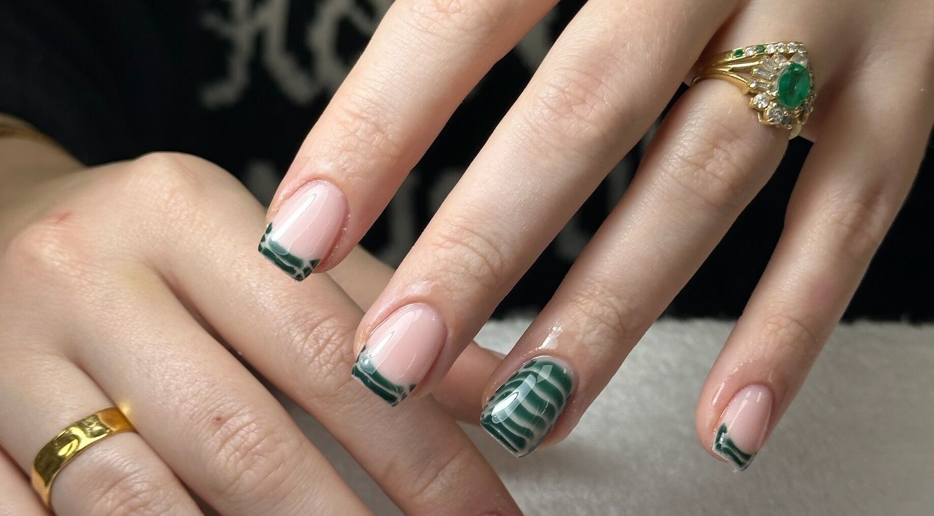 Elegant green marble nail design at Onn Nails, Stockport, England, GB.