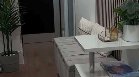 Inviting lounge area at Browtopia & Beyond | Halal Brows ♡, London, England, GB, featuring cozy decor.