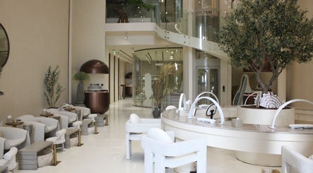 Luxurious interior of Layers Spa in Riyadh, featuring sleek furnishings and elegant decor.
