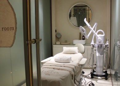 Facial room at Layers Spa, Riyadh, Riyadh Province, SA, featuring modern treatment equipment and inviting ambiance.