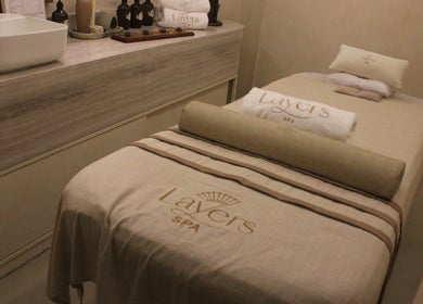 Luxurious treatment bed in Layers Spa, Riyadh, Riyadh Province, SA, featuring elegant decor.