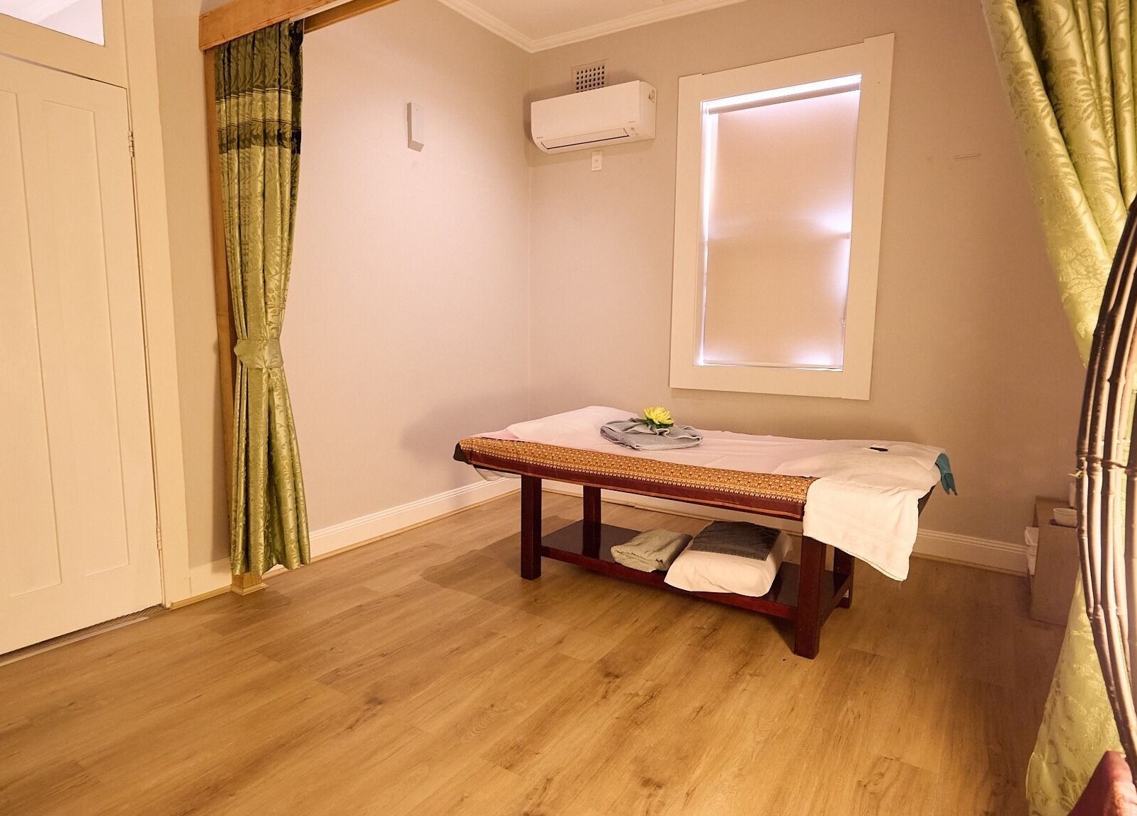 Calming massage room at Bodeze Traditional Thai Massage, Crows Nest, New South Wales, AU, featuring a comfortable table.