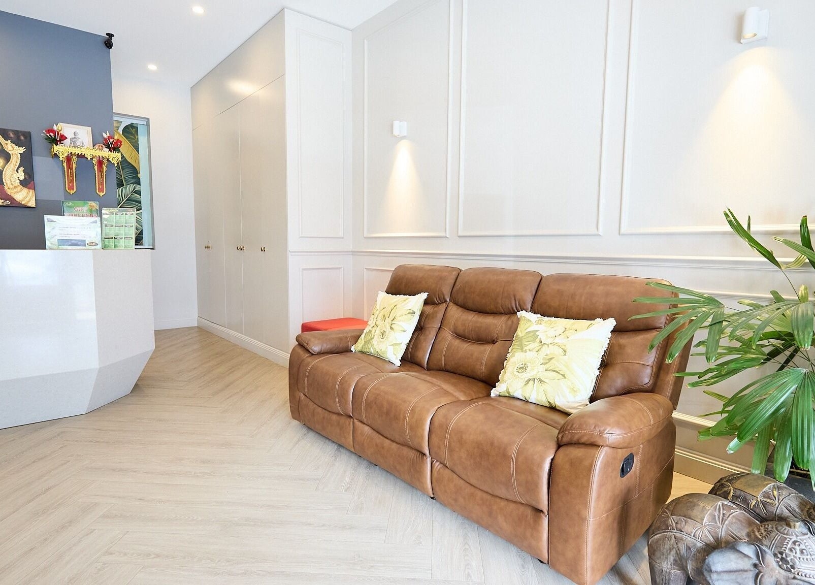 Welcoming lounge at Bodeze Traditional Thai massage, Crows Nest, New South Wales, AU. Cozy sofa and decor.