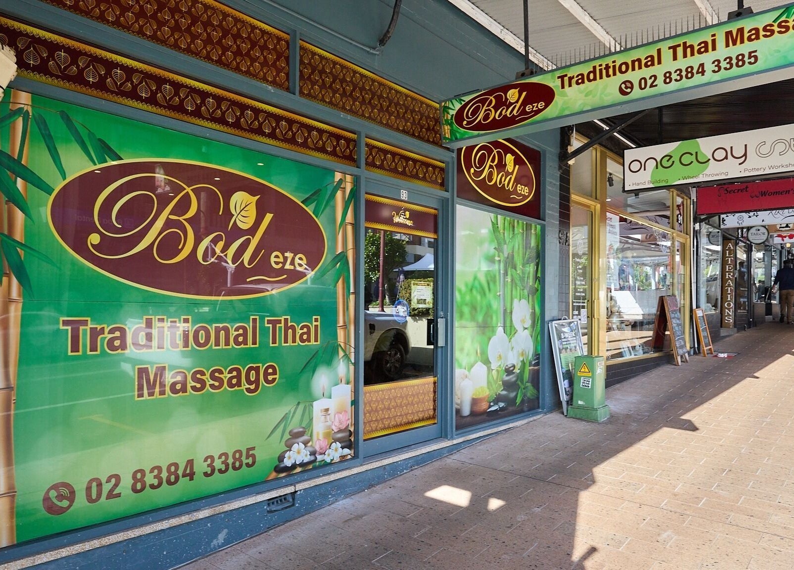 Storefront of Bodeze Traditional Thai Massage in Crows Nest, New South Wales, AU with vibrant green signage.