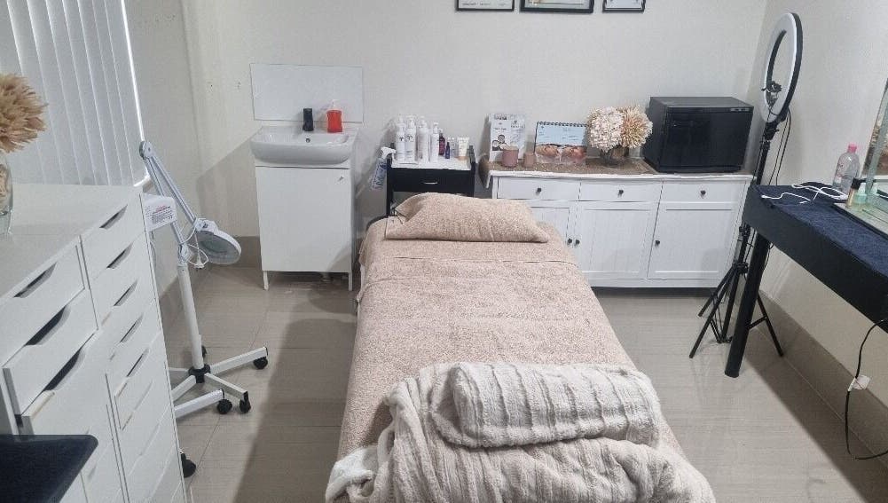 Inviting treatment room at Vicki Skin Studio in Beechboro, Western Australia, AU with a cozy bed and decor.