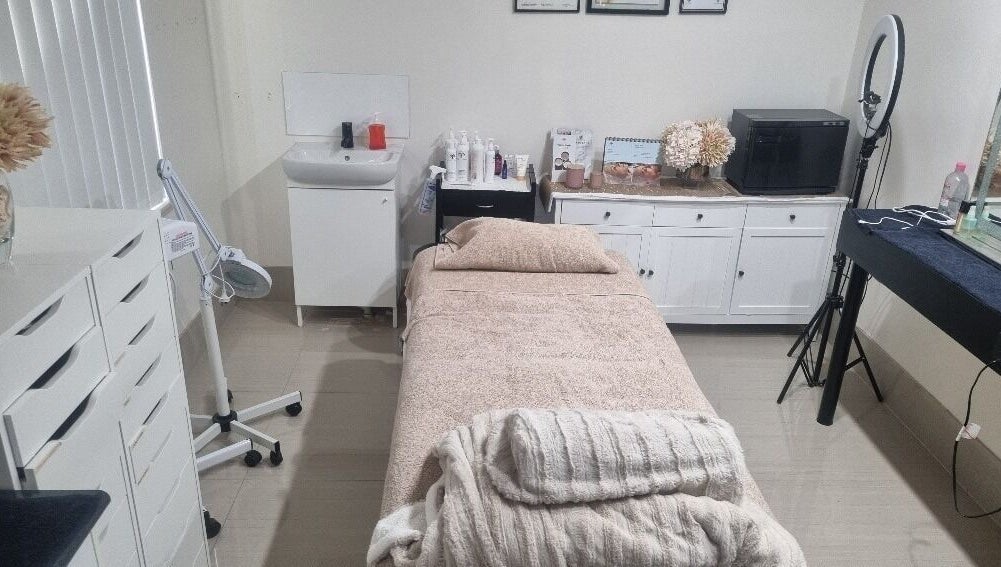 Inviting treatment room at Vicki Skin Studio in Beechboro, Western Australia, AU with a cozy bed and decor.