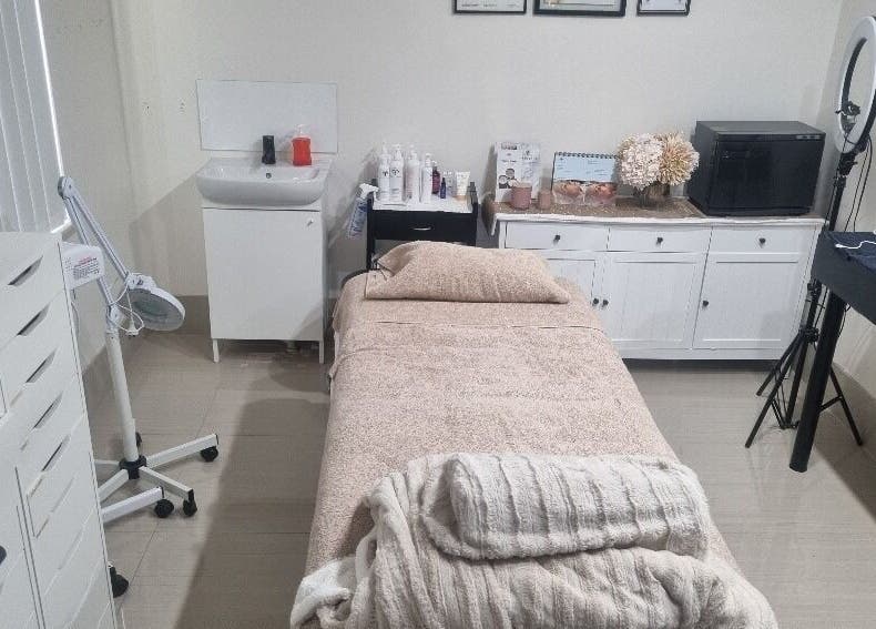 Inviting treatment room at Vicki Skin Studio in Beechboro, Western Australia, AU with a cozy bed and decor.