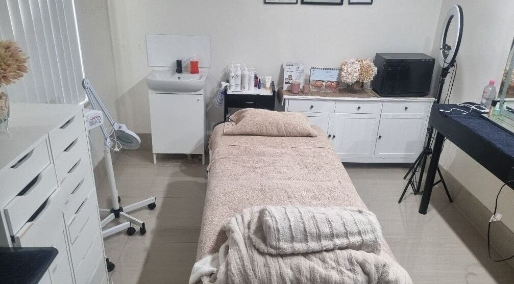 Inviting treatment room at Vicki Skin Studio in Beechboro, Western Australia, AU with a cozy bed and decor.