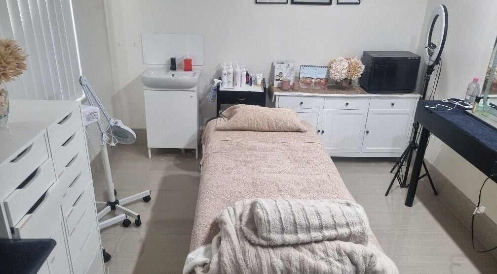 Inviting treatment room at Vicki Skin Studio in Beechboro, Western Australia, AU with a cozy bed and decor.