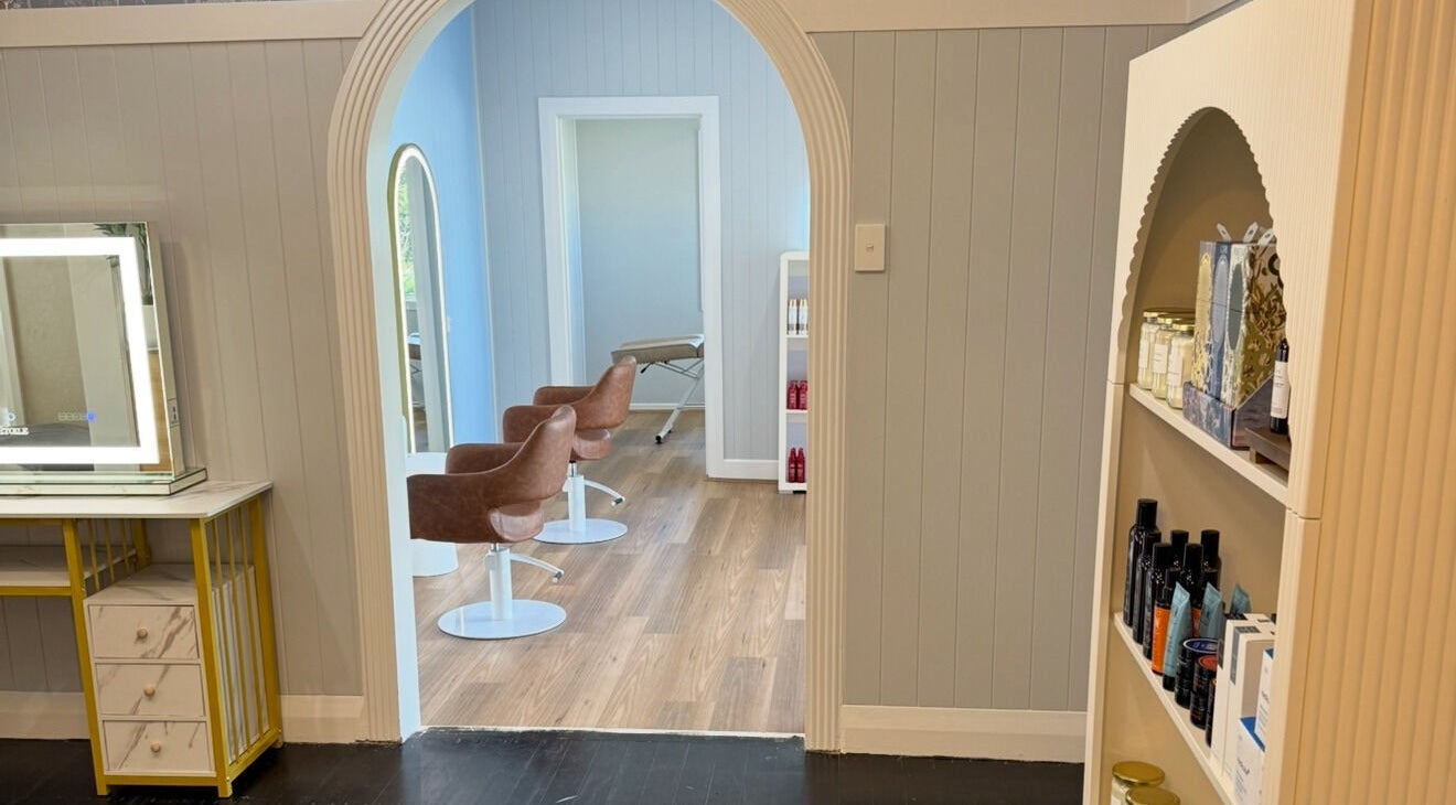 Elegant interior of Simone West Hair Makeup, Landsborough, Queensland, with modern chairs and tasteful decor.