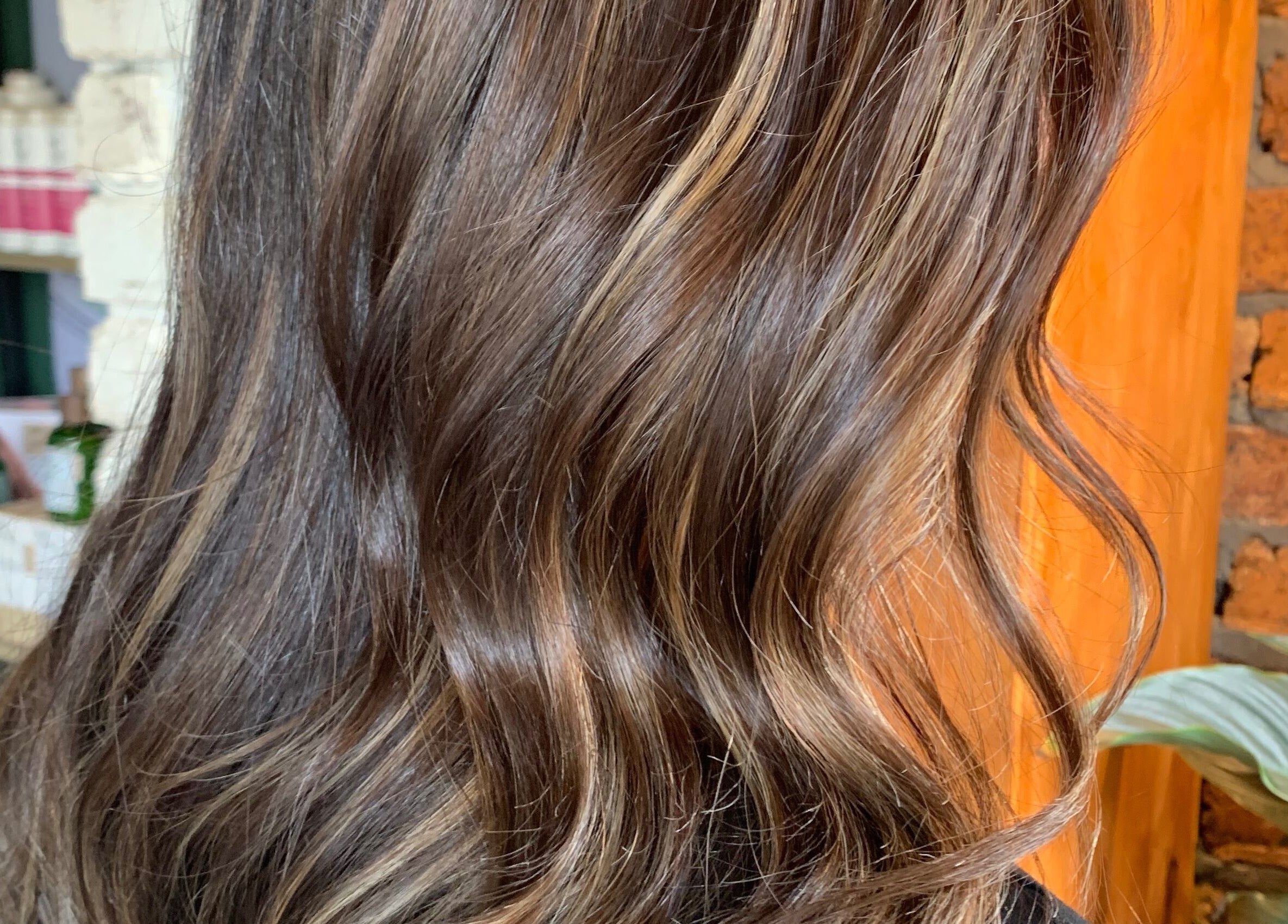 Elegant wavy hairstyle at Simone West Hair Makeup in Landsborough, Queensland, AU. Perfect for special occasions.