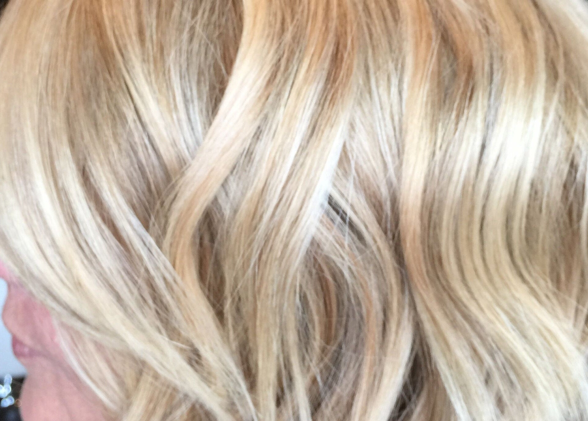 Close-up of a blonde hairstyle created at Simone West Hair Makeup, Landsborough, Queensland, AU.