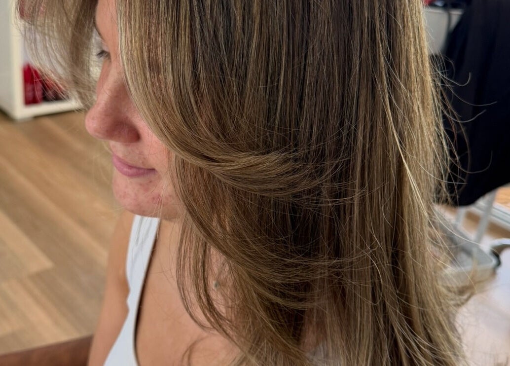 Woman with styled hair at Simone West Hair Makeup salon in Landsborough, Queensland, AU.