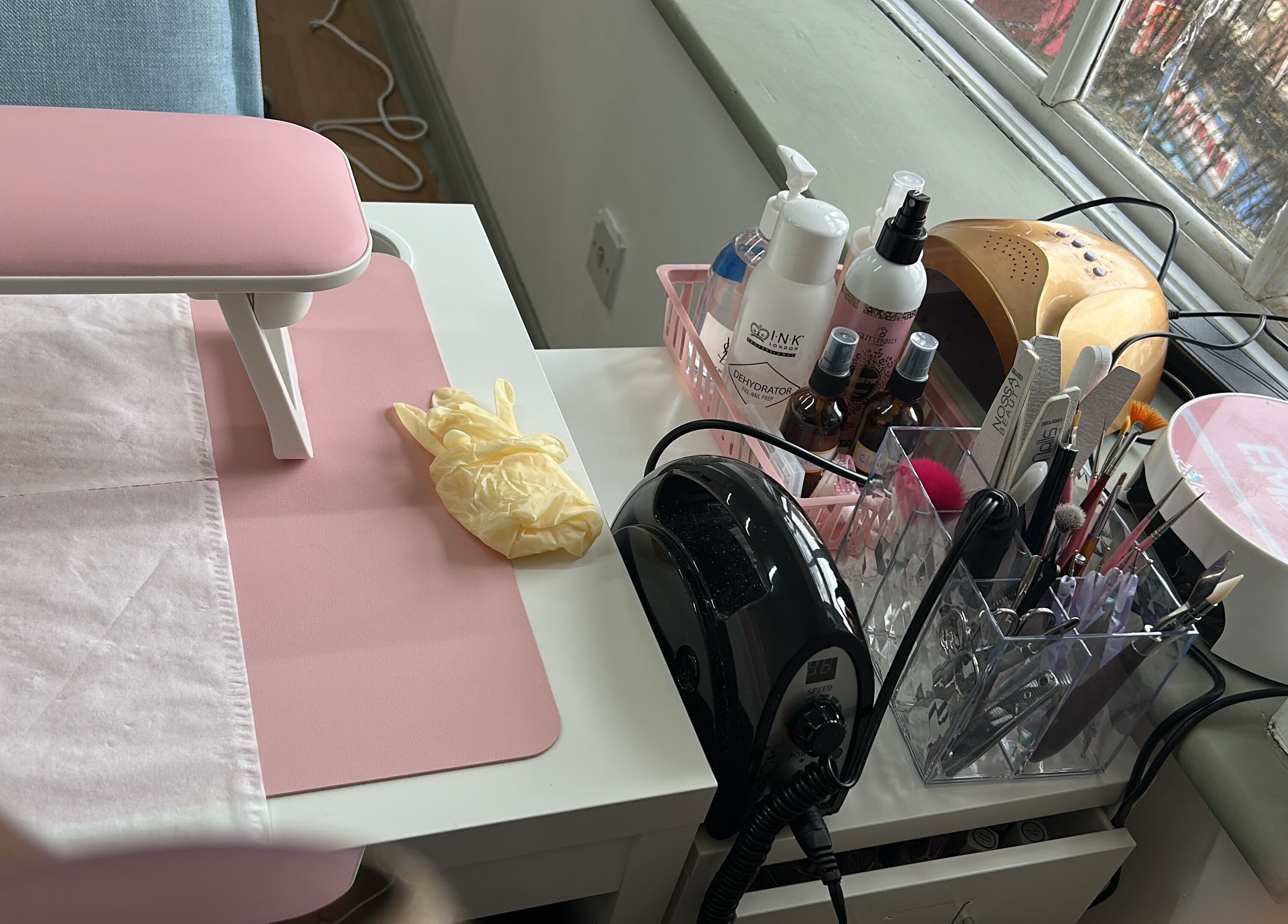 Manicure setup at Nit Sparkle Nail, Dublin, County Dublin, IE, featuring tools and products.