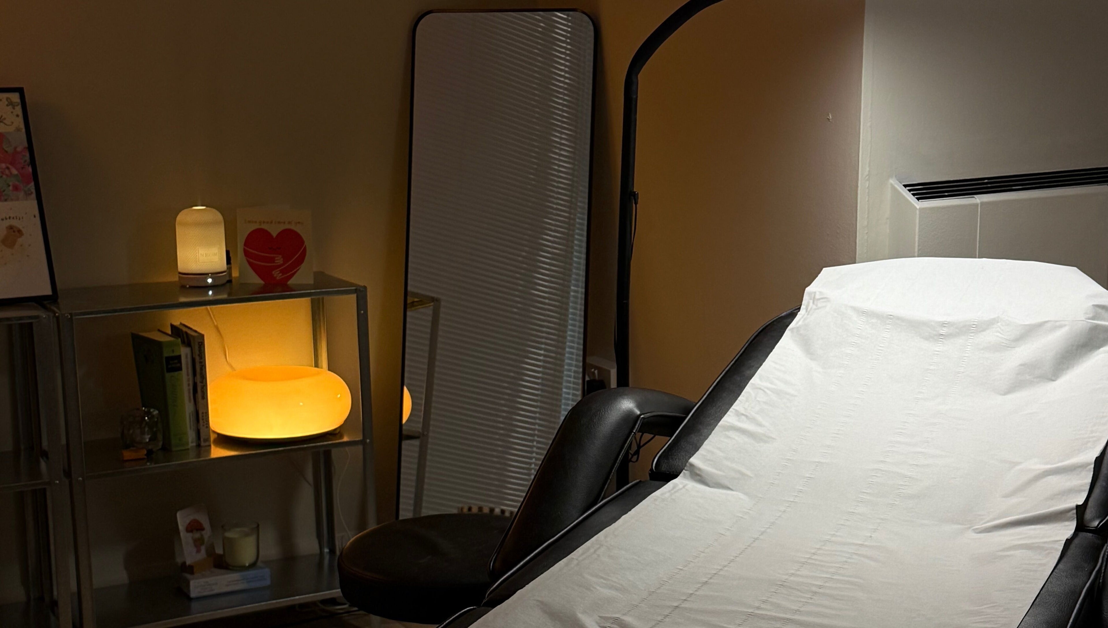 Relaxing wellness room at emstudio, Clydebank, Scotland, GB, featuring a treatment chair and soothing ambiance.