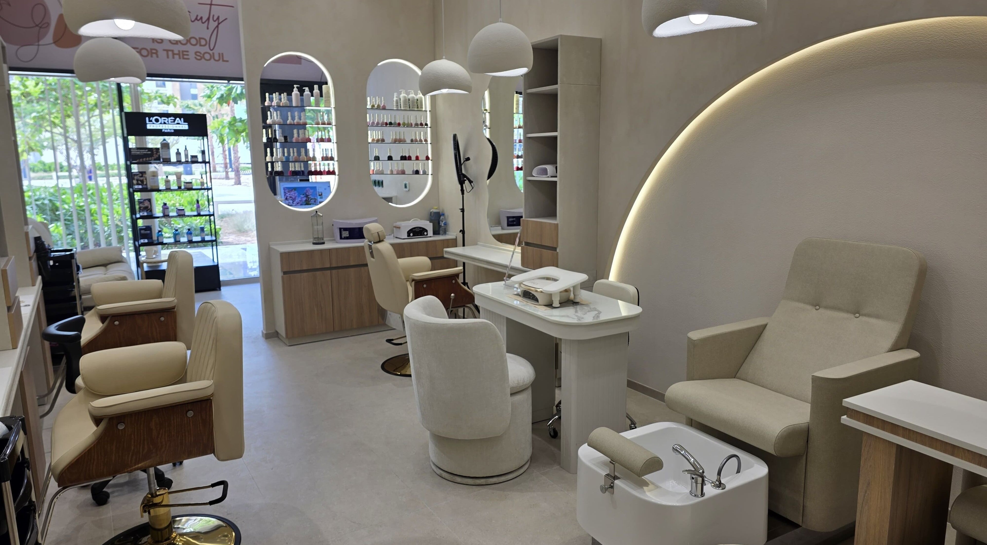 Interior of Tia Beauty Salon in Dubai, Dubai, AE showcasing modern chairs and luxury spa amenities.