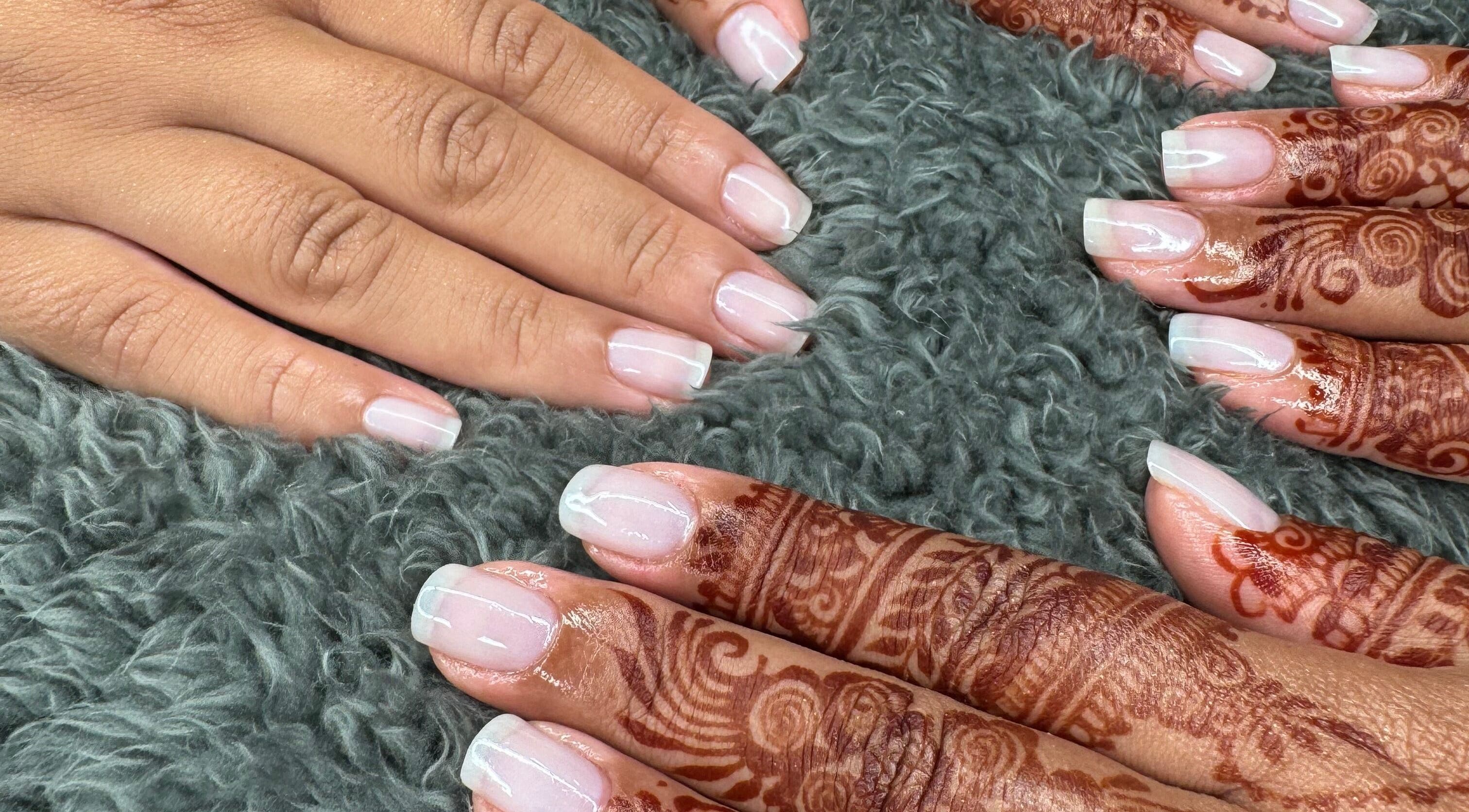 Elegant nail art with henna at Mani.festation.nbt, Mountsorrel, England, GB. Showcasing delicate manicure styles.