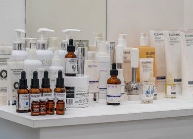 Beauty products at It's Angies, London, England, GB displayed on a shelf, highlighting skincare essentials.