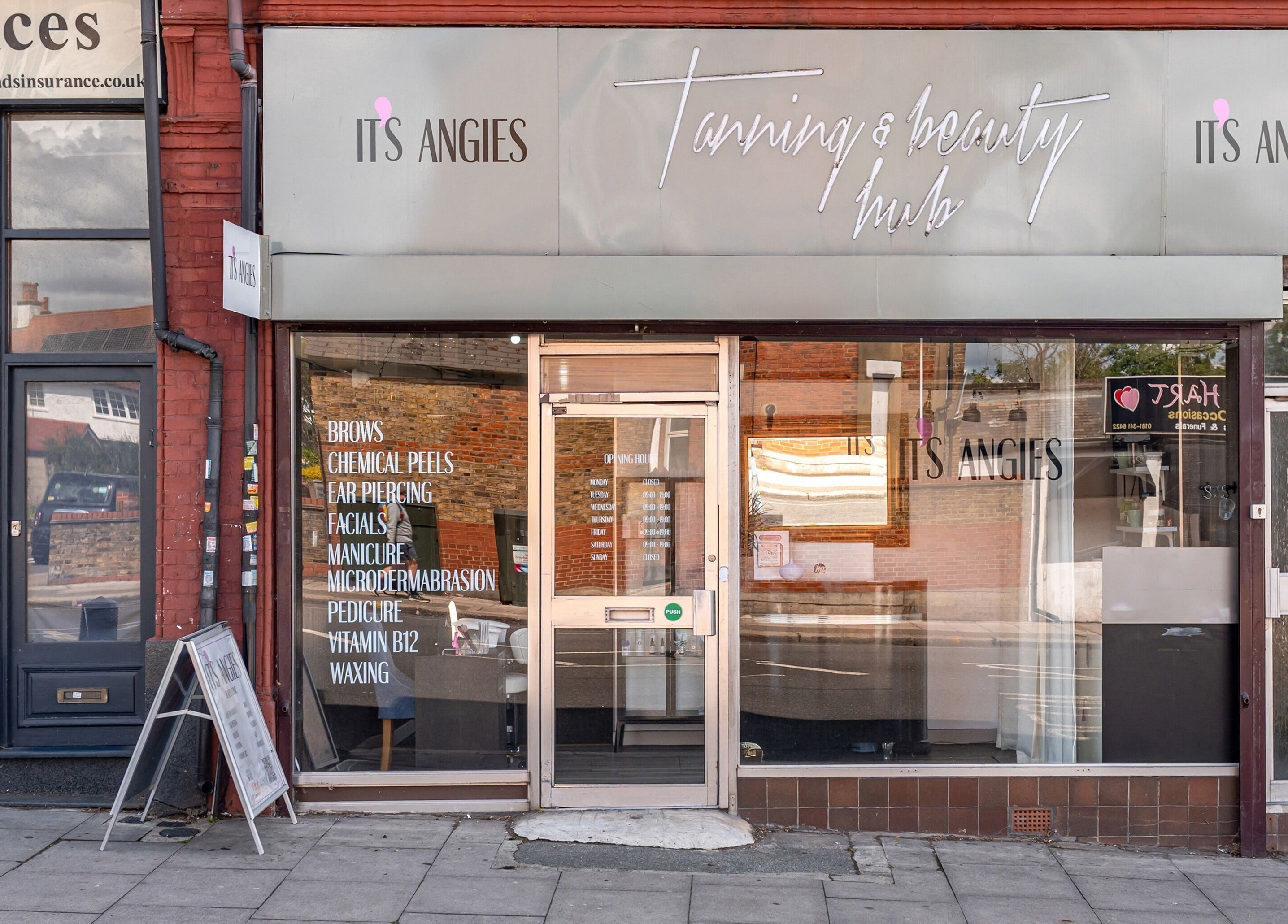 Exterior view of It's Angies beauty hub in London, England, GB showcasing services like facials and waxing.