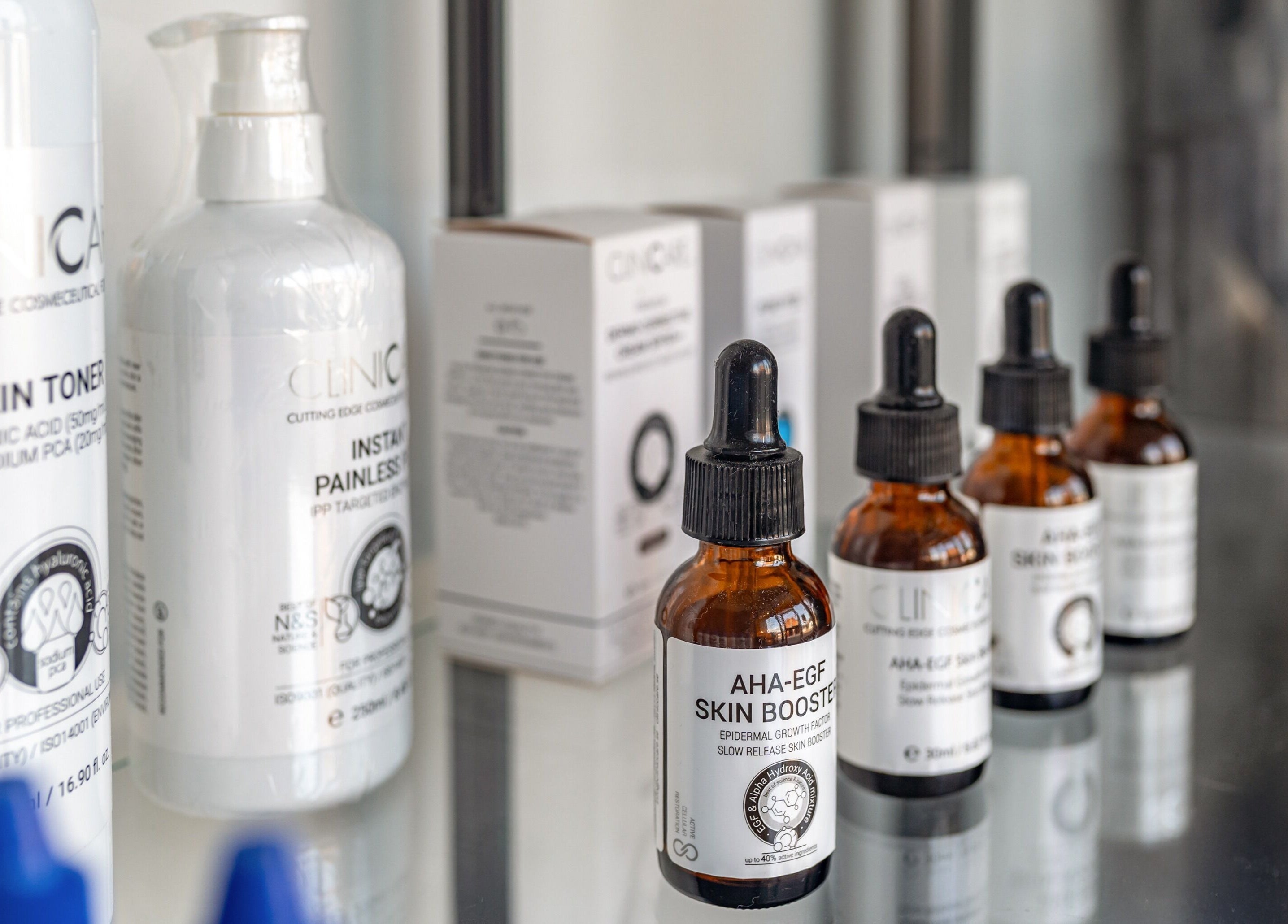 Close-up of skin toner and serum bottles at It's Angies, London, England, GB.