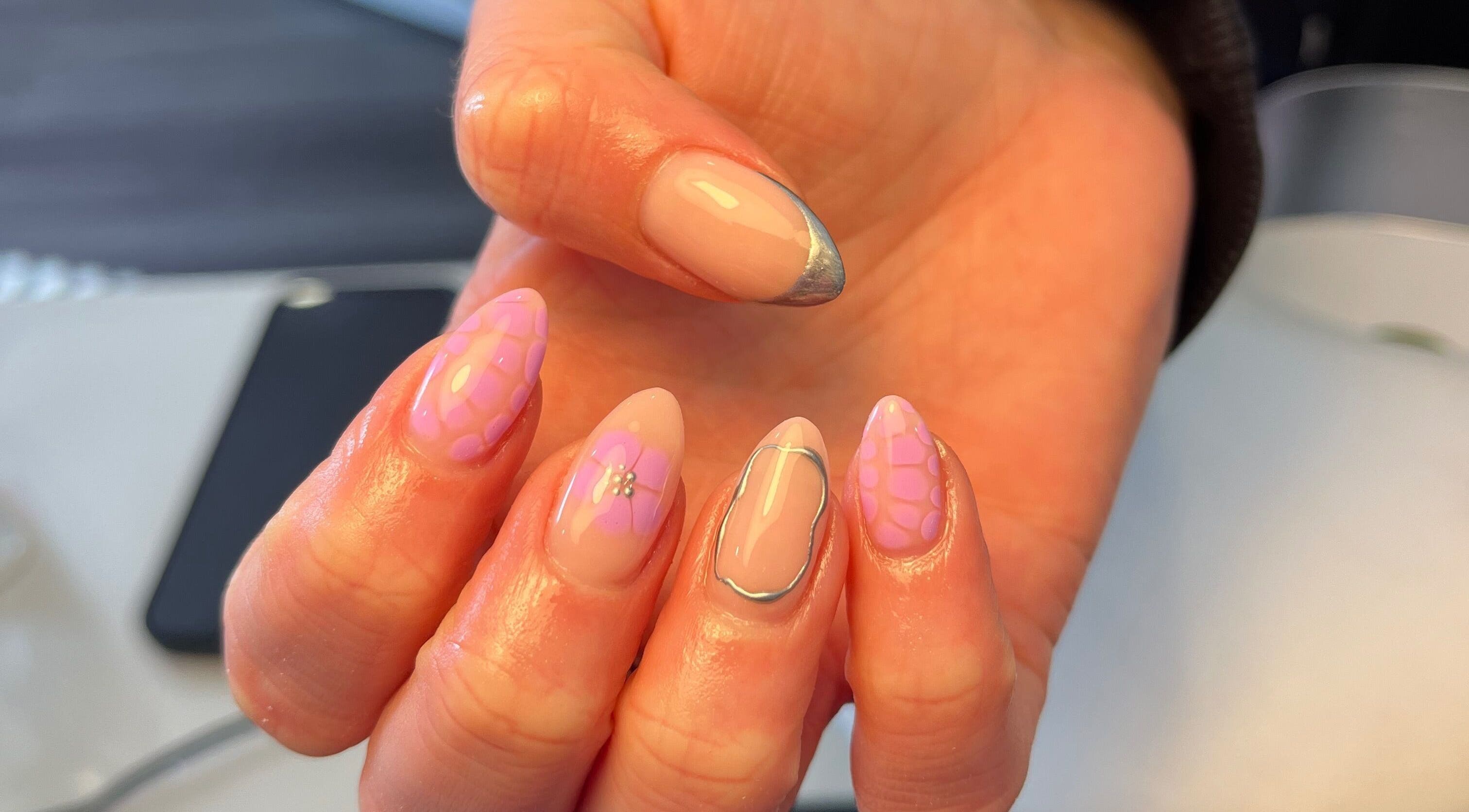 Stylish nail art at Ella W Smith Beauty in Clayton-le-moors, England, GB showcasing intricate designs.