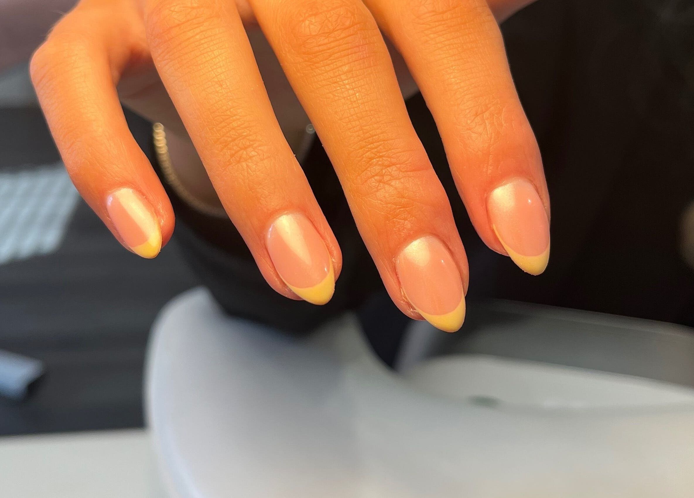 Elegant French manicure at Ella W Smith Beauty, Clayton-le-moors, England, GB. Perfectly polished nails.