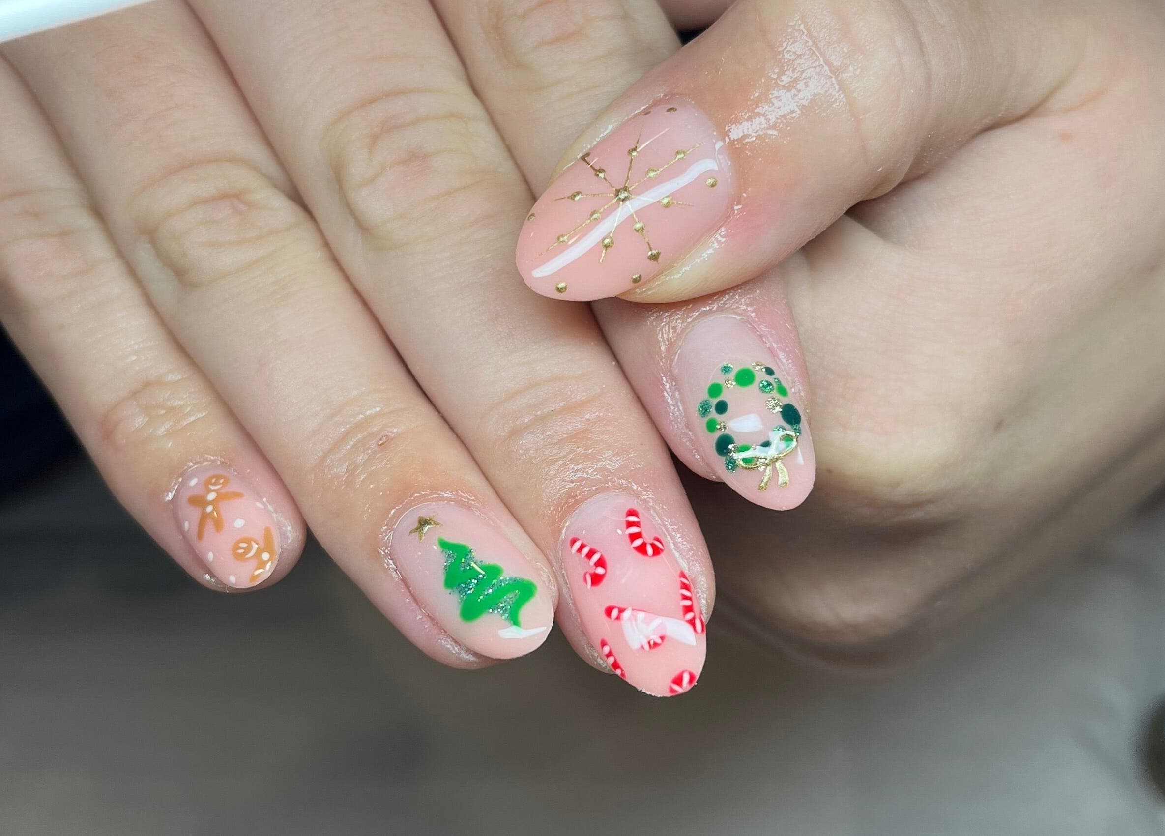 Intricate holiday nail art at Ella W Smith Beauty, Clayton-le-moors, England, GB, featuring festive designs.