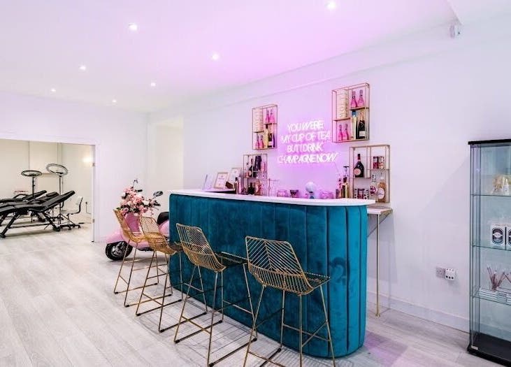 Chic beauty lounge at Refine Beauty By Meg in Stockport, England featuring stylish decor and treatment area.
