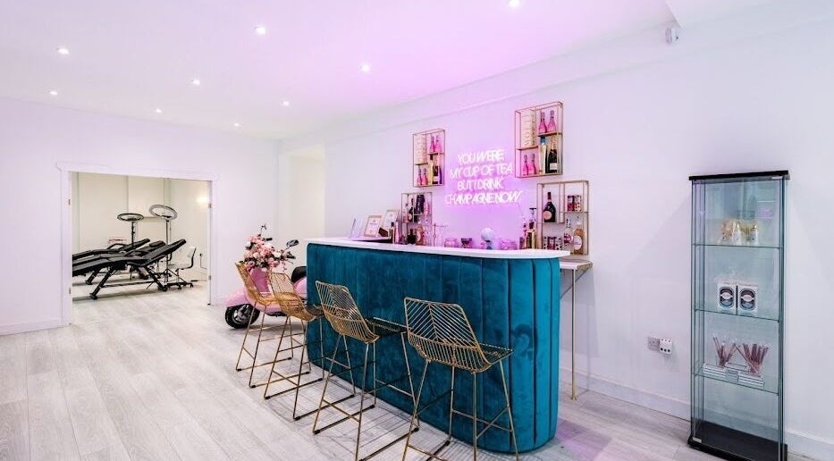Chic beauty lounge at Refine Beauty By Meg in Stockport, England featuring stylish decor and treatment area.