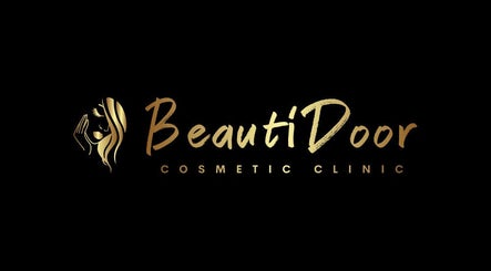 BeautiDoor Cosmetic Clinic logo in gold, located in Mississauga, Ontario, CA.