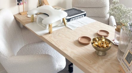 Gloss by Storm's elegant nail station at Bowbrook, England, GB, featuring comfort chairs and manicure tools.