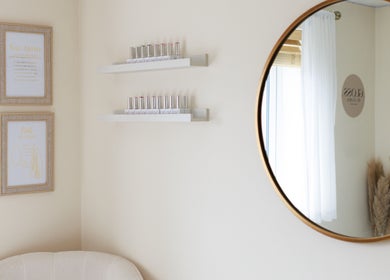 Serene corner at Gloss by Storm, Bowbrook, England, GB with mirror, nail polish, and decor.