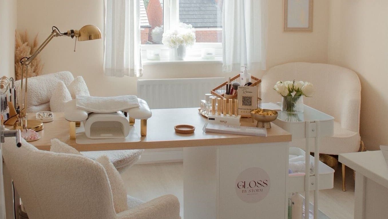 Serene beauty space at Gloss by Storm, Bowbrook, England, GB with plush seating and elegant decor.