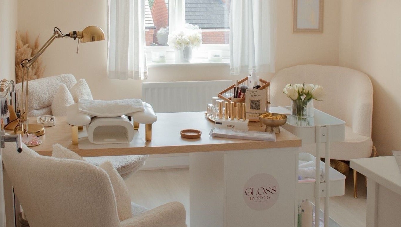 Serene beauty space at Gloss by Storm, Bowbrook, England, GB with plush seating and elegant decor.