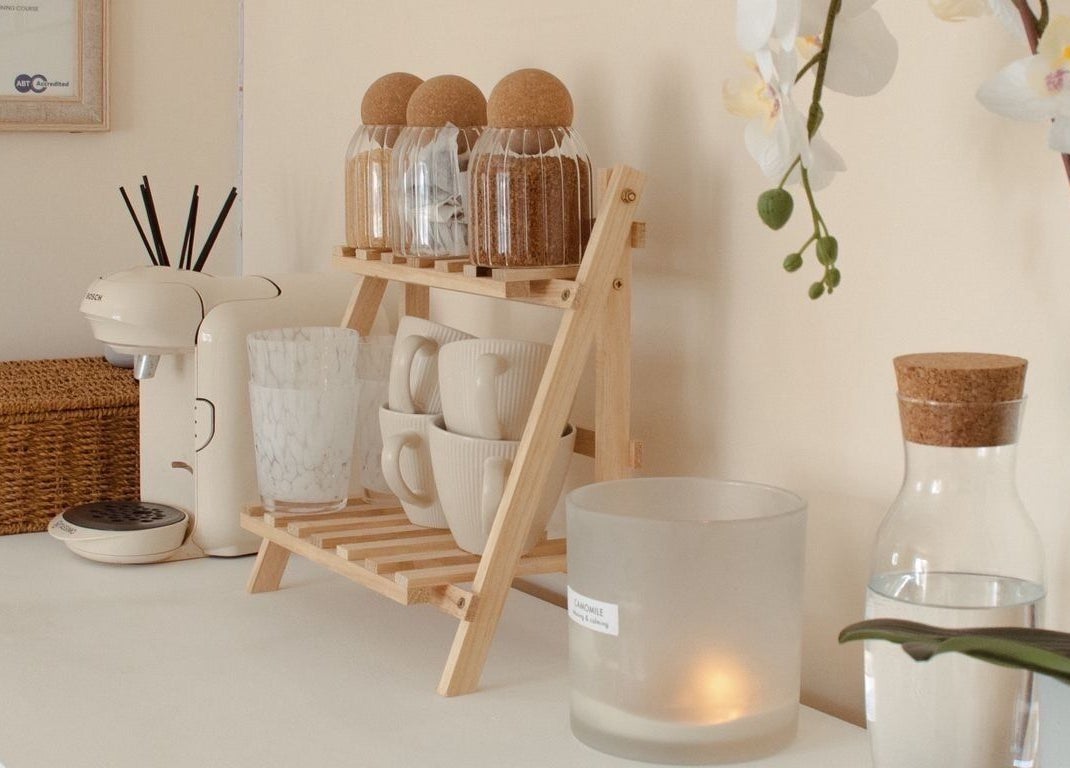 Cozy coffee setup at Gloss by Storm, Bowbrook, England, GB with elegant decor and fresh orchids.