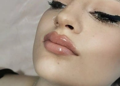 Elegant woman with flawless makeup at Nordik Aesthetics @ Dahlin, Sandbach, England, GB.