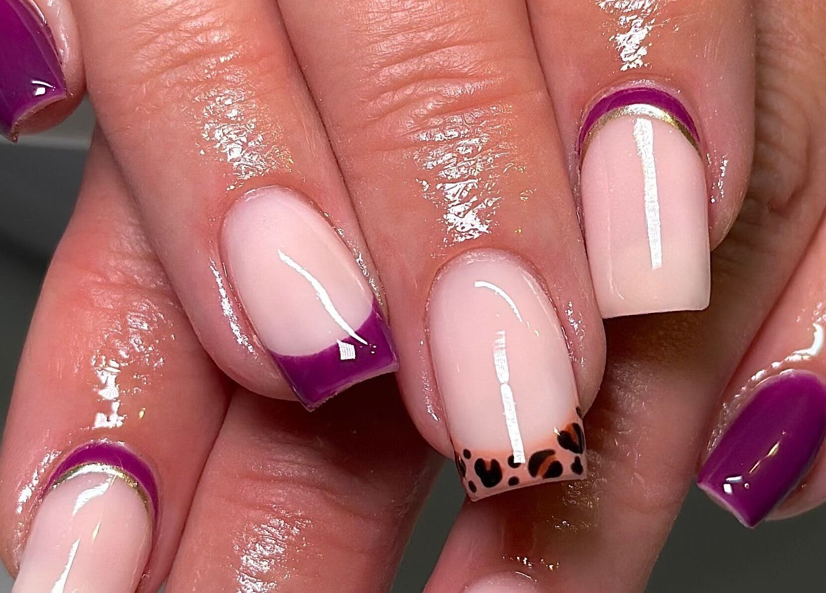 Stylish nails with purple gel polish at Nails By CC, Chorley, England, GB.