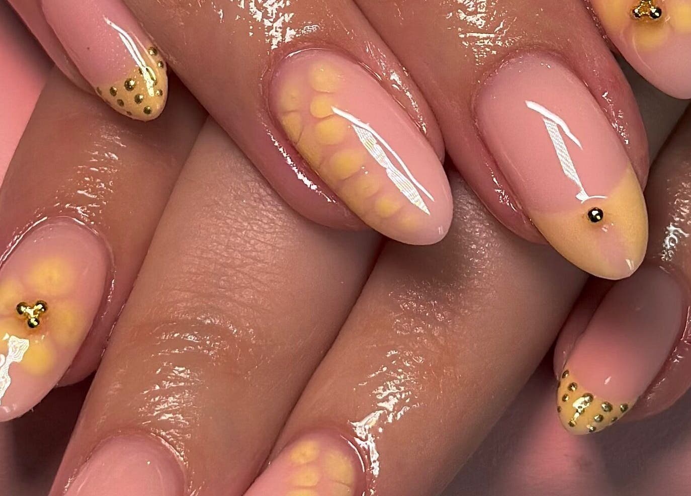 Stylish nail art with gold accents at Nails By CC, Chorley, England, GB. Perfect elegance for a chic look.