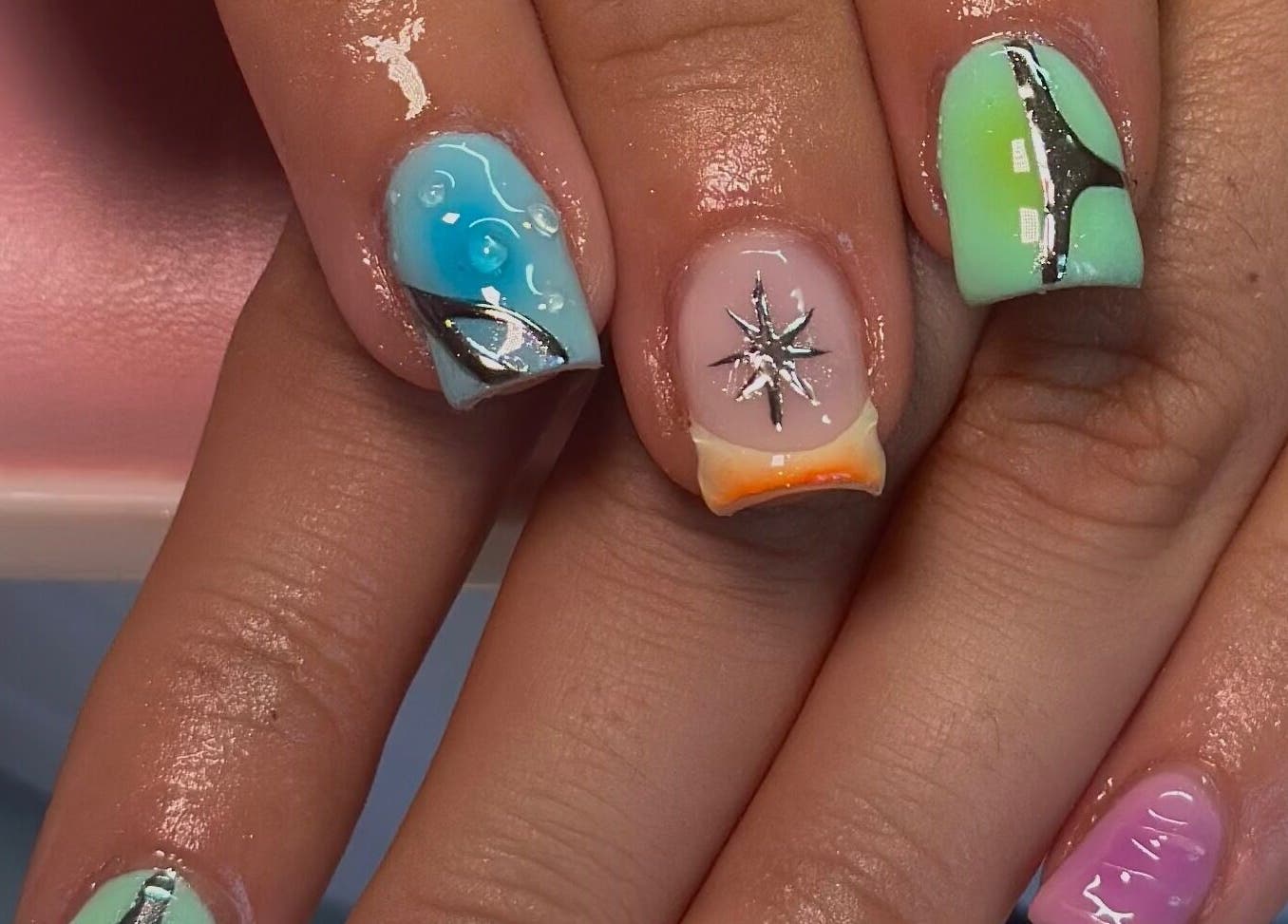 Vibrant nail art design at Nails By CC in Chorley, England, GB. Unique patterns and colors on manicured nails.