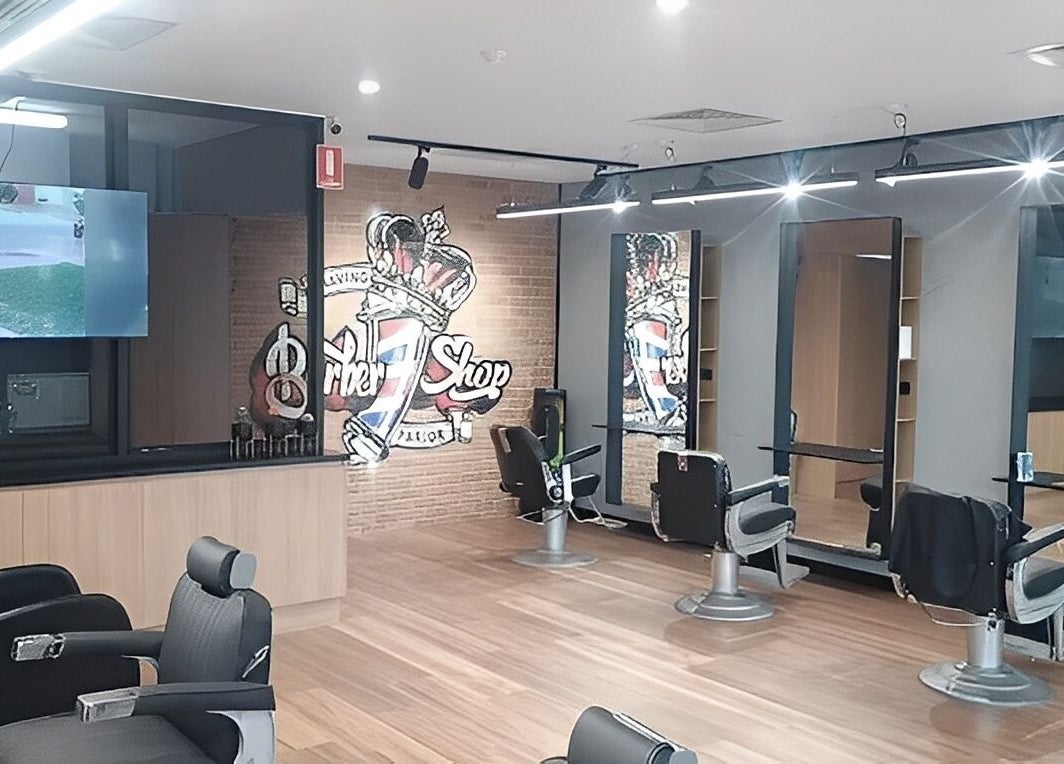 Interior of Allan's Men's Hairdressing - Warrabrook, showcasing stylish barber chairs, Warabrook, New South Wales, AU.