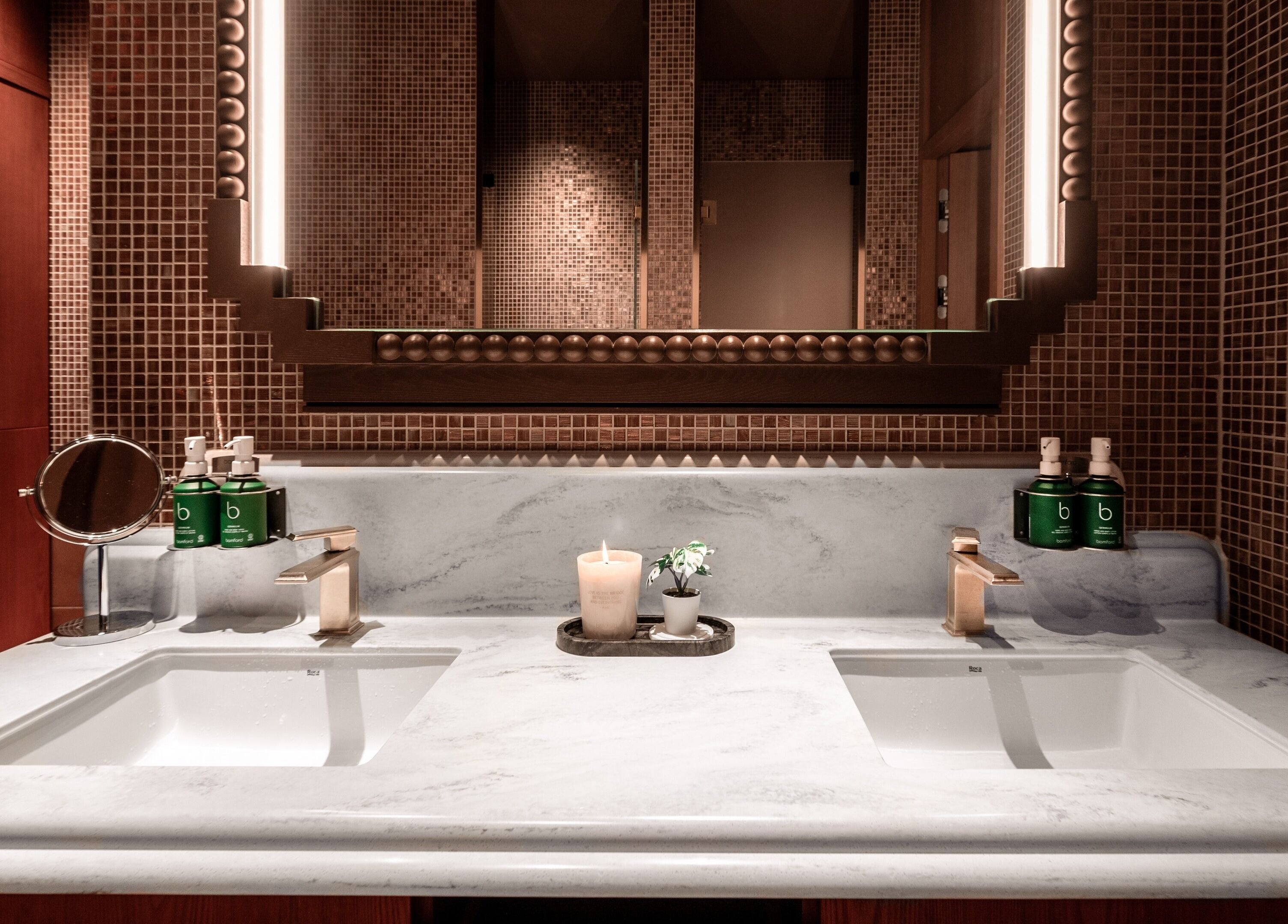 Luxurious vanity at Lost/Found Spa on Hong Kong Island, featuring elegant design and premium skincare products.