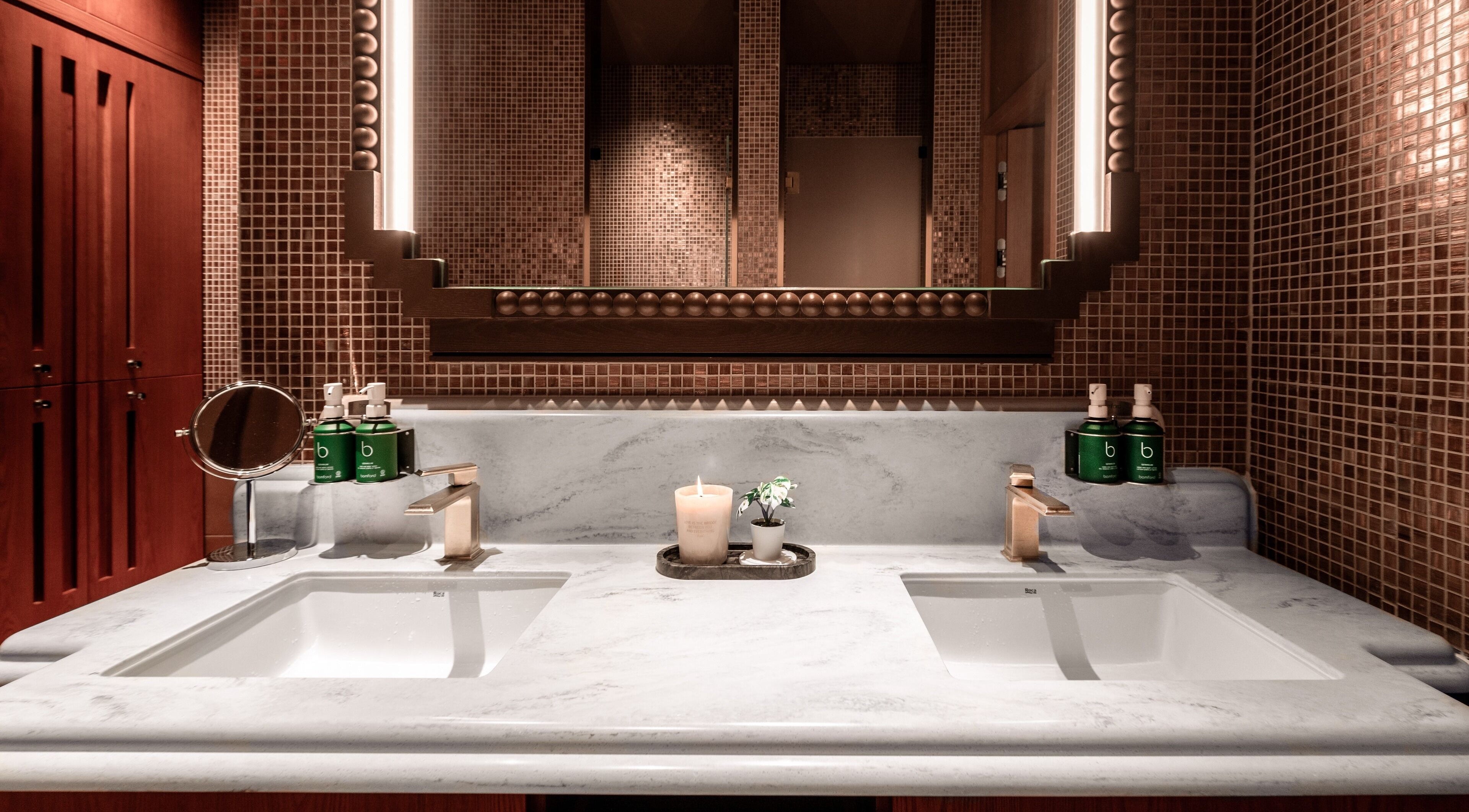 Luxurious vanity at Lost/Found Spa on Hong Kong Island, featuring elegant design and premium skincare products.
