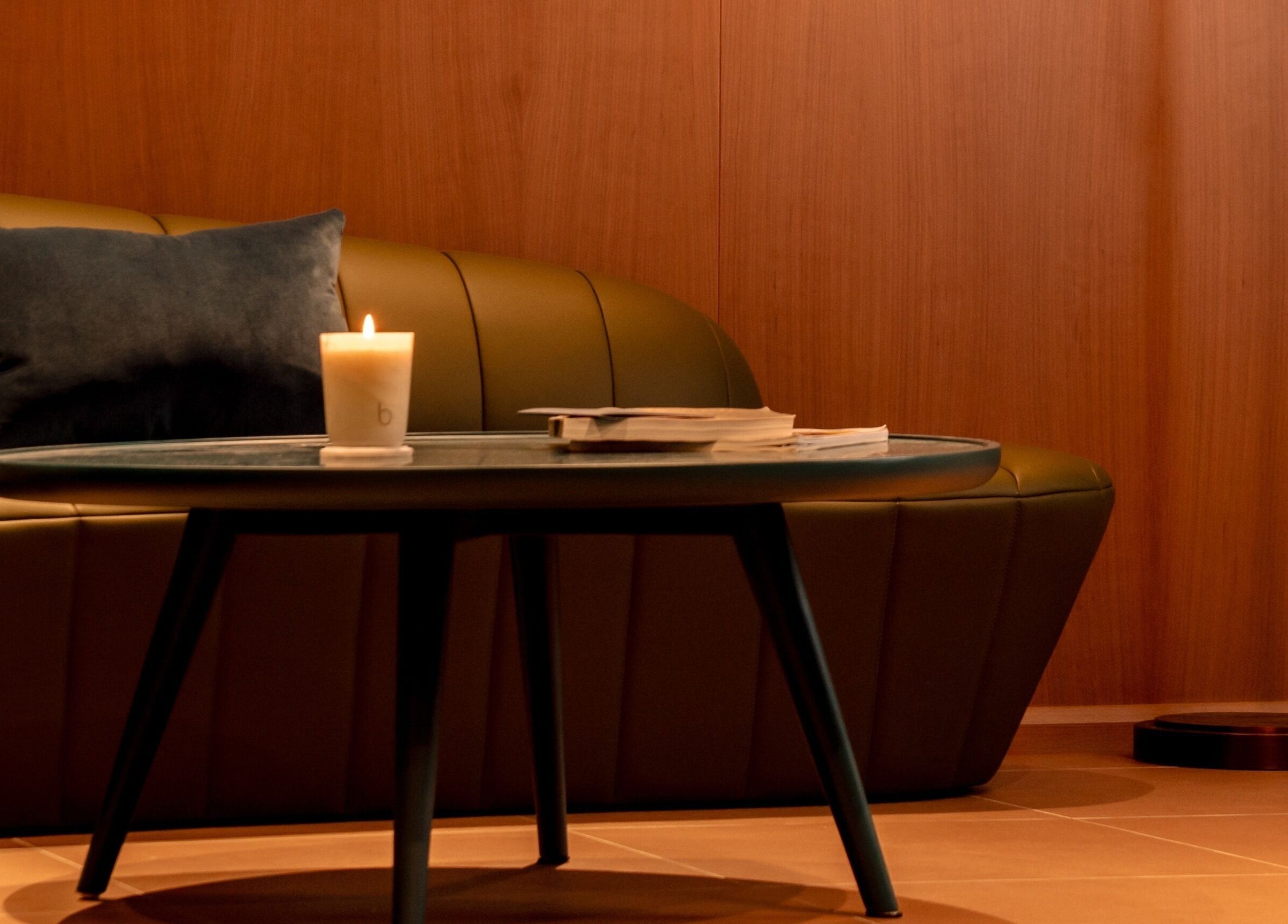 Relaxing corner with candlelit table at Lost/Found Spa, Hong Kong Island, Hong Kong Island, HK.