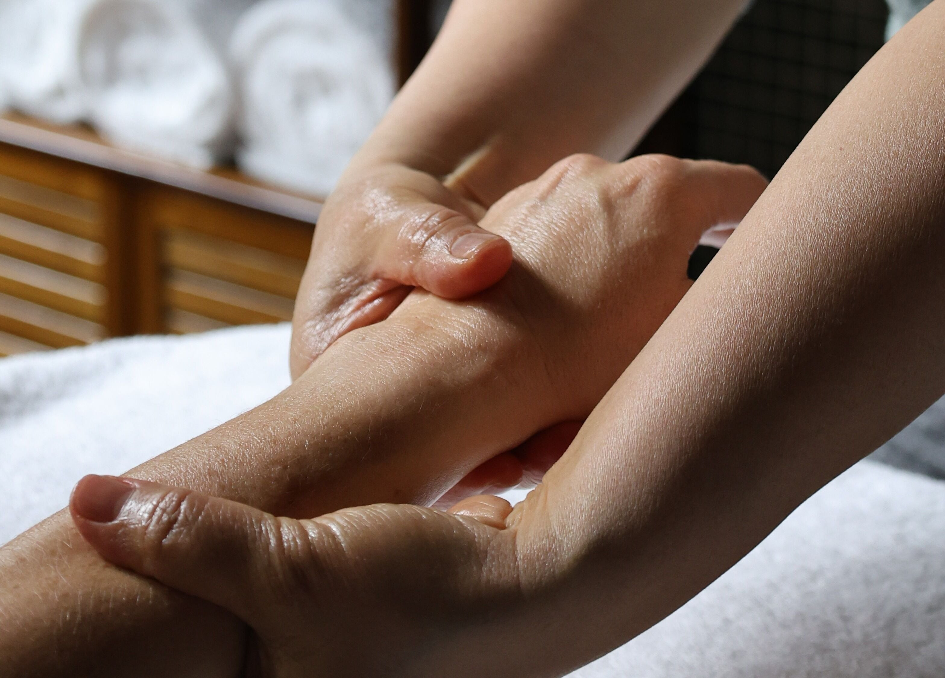 Relaxing hand massage at Lost/Found Spa, Hong Kong Island, HK, offering soothing spa experiences.