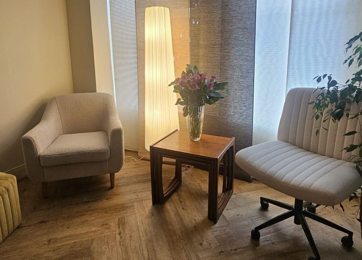 Inviting lounge area at Filly Green in Douglas, IM featuring comfortable chairs and elegant decor.