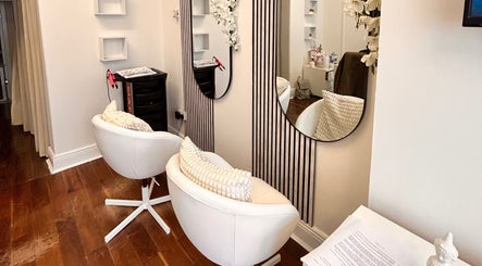 Elegant seating and mirrors at Inches By Alba, Dublin, County Dublin, IE, highlighting modern beauty vibes.