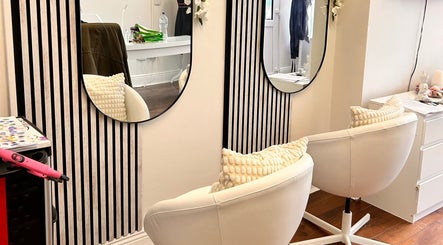 Modern salon chairs and mirrors at Inches By Alba, Dublin, County Dublin, IE, showcasing elegance and style.