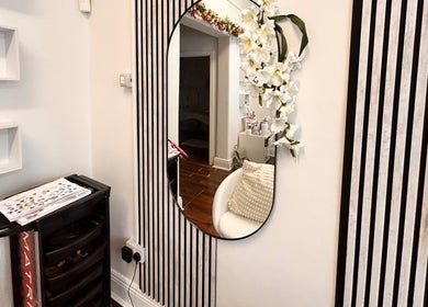 Stylish mirror with floral decor at Inches By Alba, Dublin, County Dublin, IE.